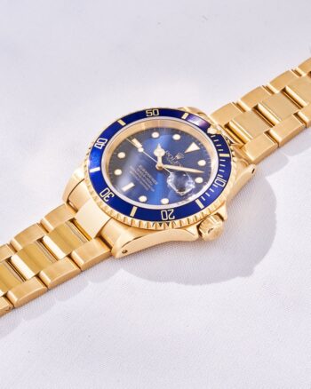 Rolex Submariner Gelbgold Blau
